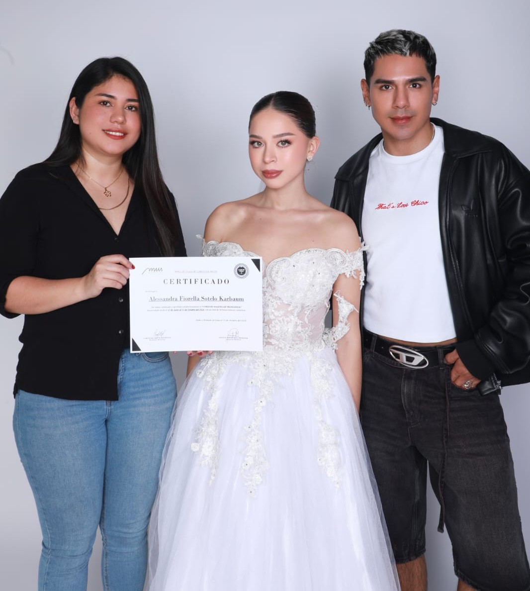 Ale Karbaum receiving her diploma of completion for a professional makeup course at MUS School in Peru.